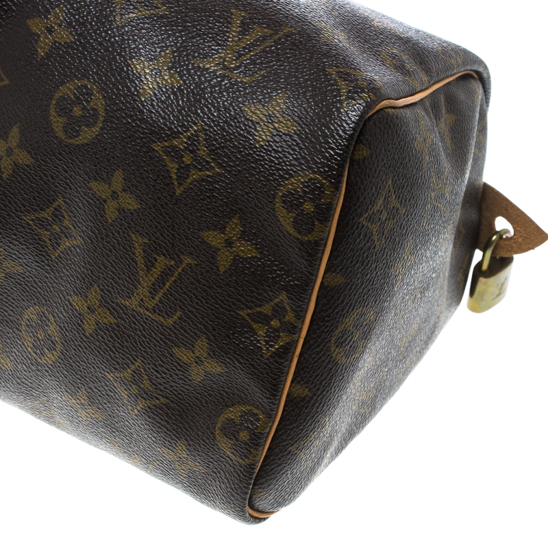 Sold at Auction: A Louis Vuitton Speedy Canvas Monogram Bag with Dust Cover.  Checked LV canvas with padlock. Red textile interior. 33cm x 25cm. Ref:  13260. In good condition but please see