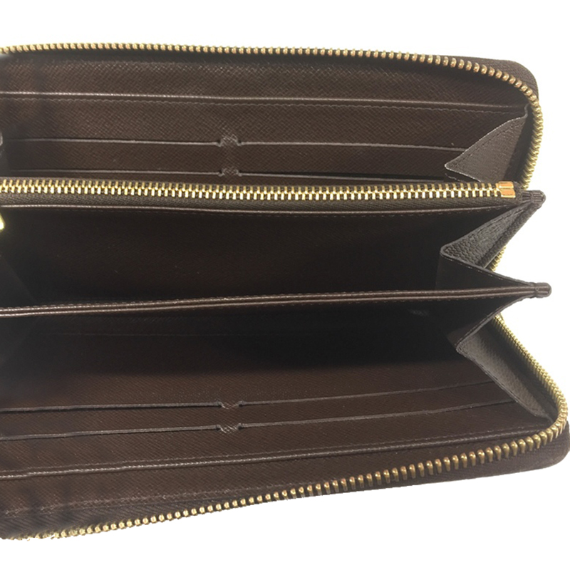 

Louis Vuitton Damier Ebene Canvas Zipper Wallet, Brown