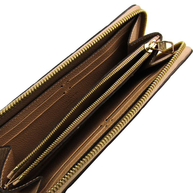 

Louis Vuitton Dune Monogram Empreinte Leather Zippy Wallet, Yellow