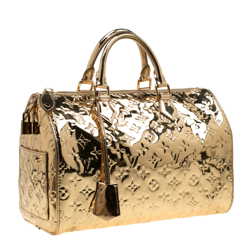 Speedy handbag Louis Vuitton Gold in Plastic - 14078181