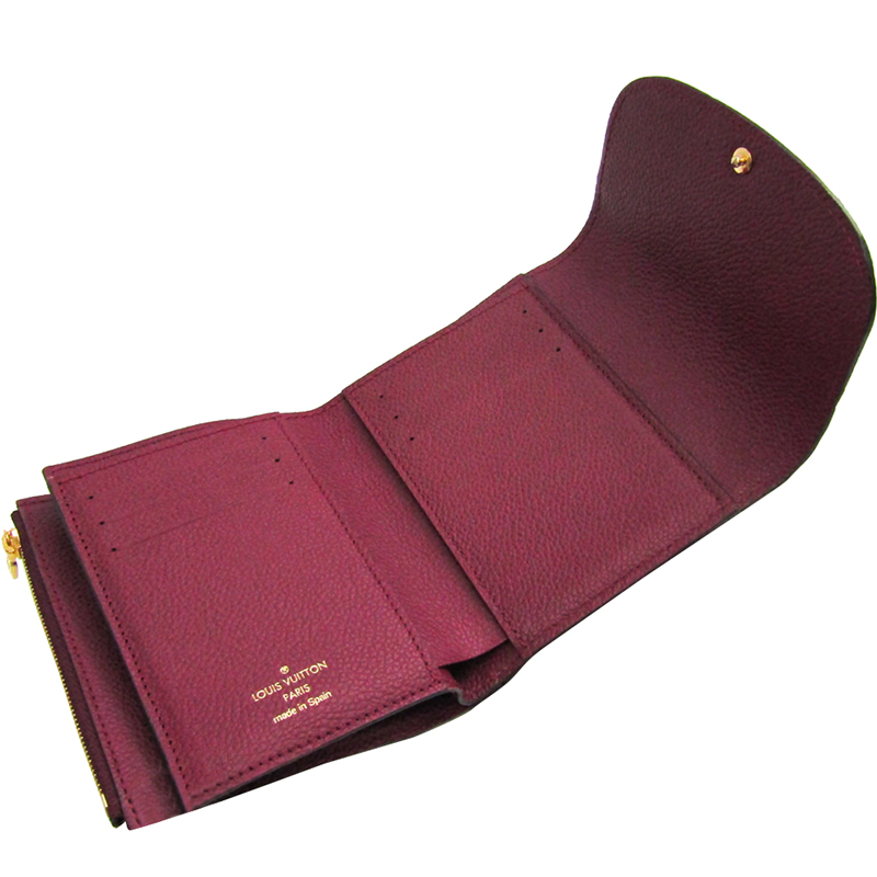 

Louis Vuitton Monogram Empreinte Leather Portefeuille Ariane Raisin Tri-Fold Wallet, Purple