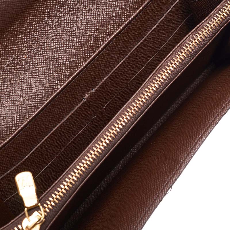 

Louis Vuitton Damier Ebene Canvas Sarah Wallet, Brown