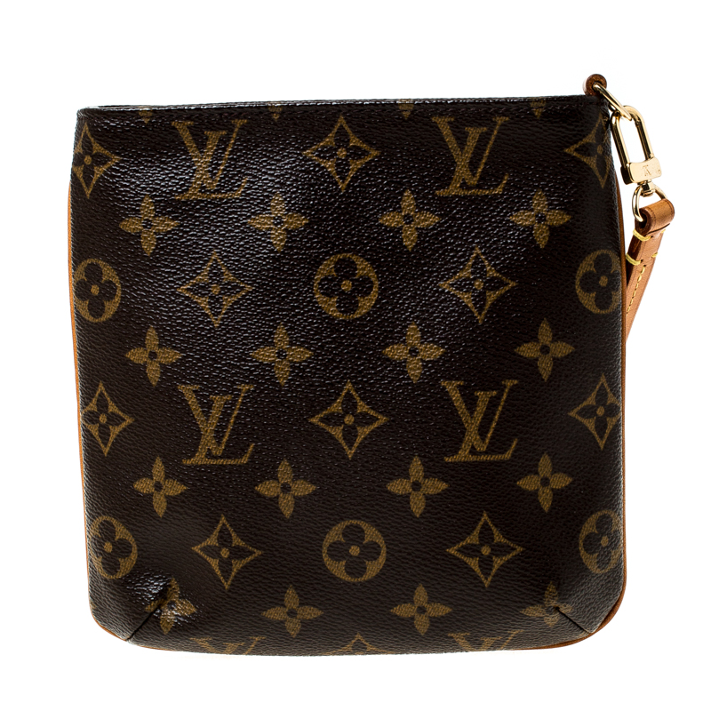 Pretty In Patina - This playfully Louis Vuitton Partition Bag is a quick  and easy way to carry all your essentials! Gotta love a Clutch!  #PrettyinPatina #LouisVuitton #Partition #Monogram #designer #LVclutch