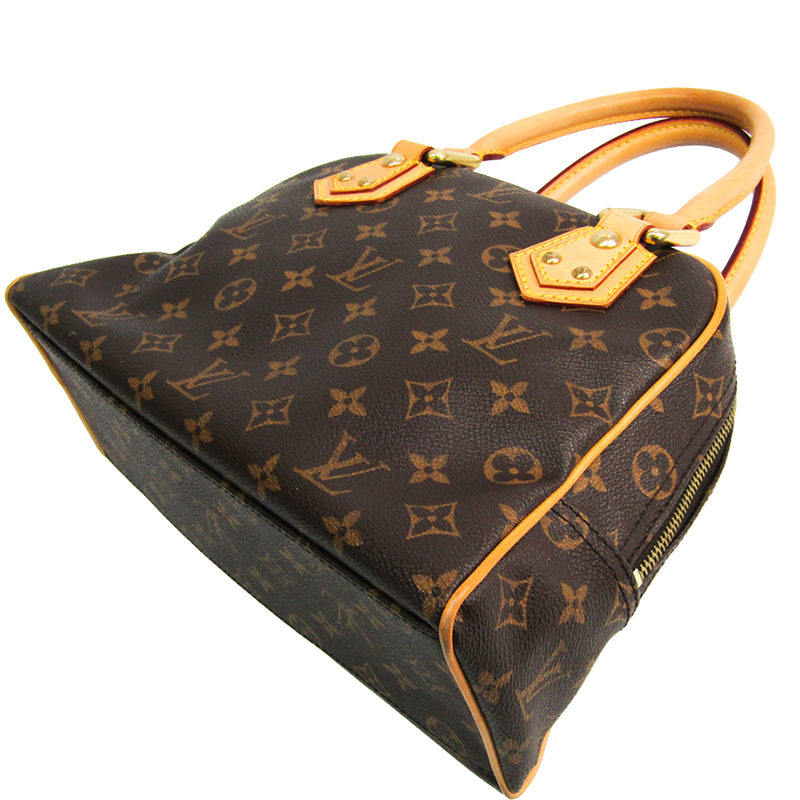 

Louis Vuitton Monogram Canvas Manhattan PM Bag, Brown