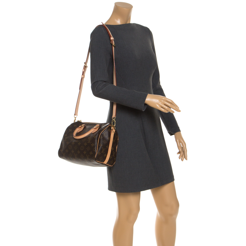 

Louis Vuitton Monogram Canvas Speedy 25 Bandouliere Bag, Brown