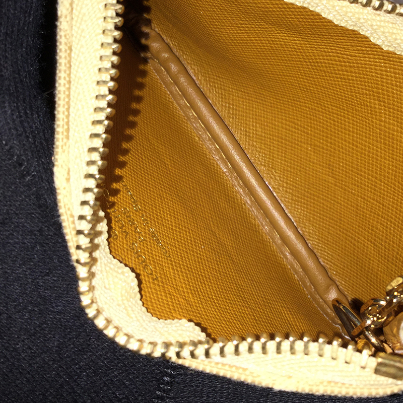 

Louis Vuitton Beige Monogram Canvas Mini Poschette Wallet