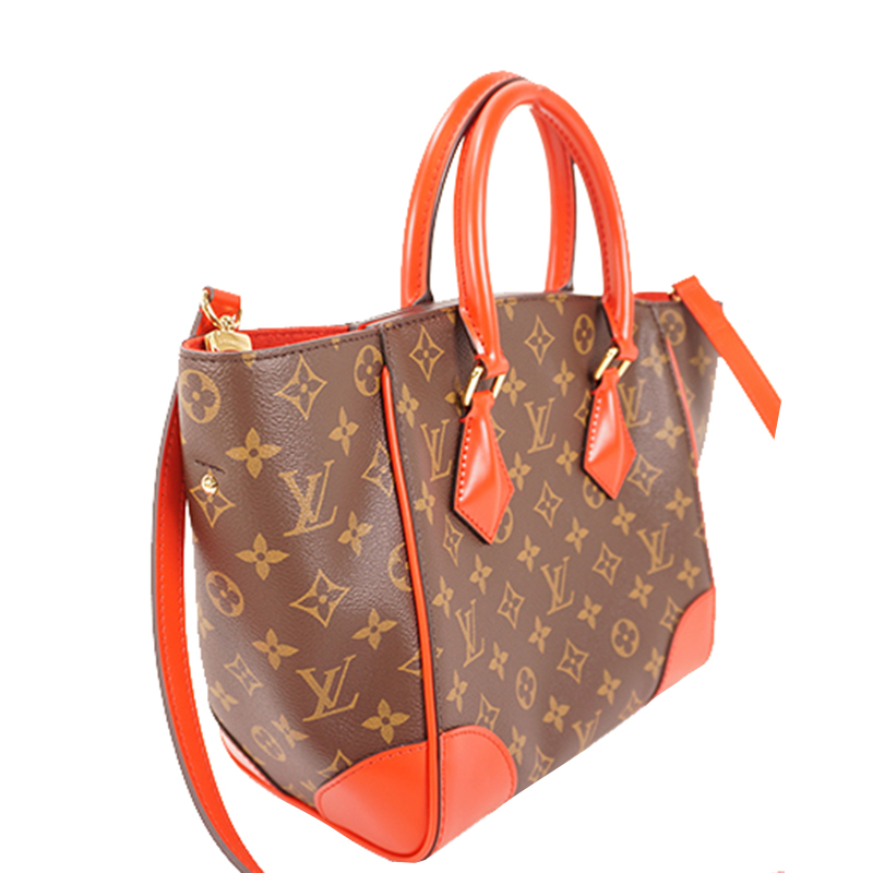 

Louis Vuitton Monogram Canvas Phoenix PM Bag, Brown