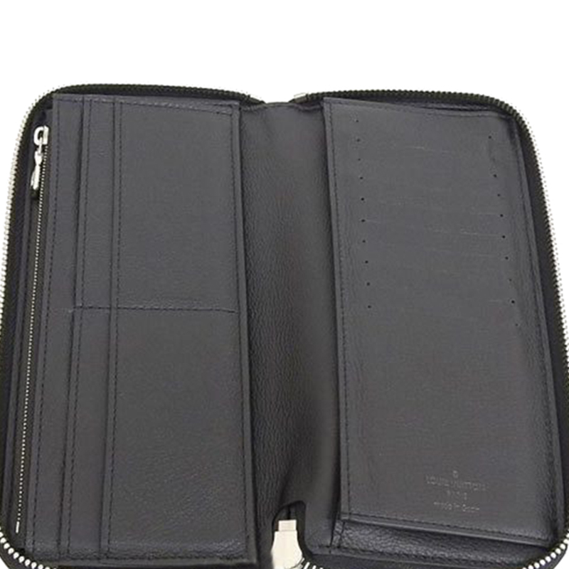 

Louis Vuitton Noir Tolyon Leather Zippy Vertical Wallet, Black