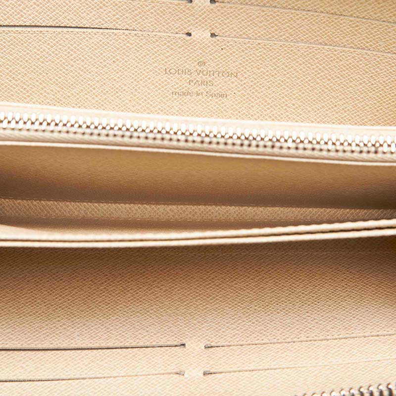 

Louis Vuitton White Epi Leather Zippy Wallet