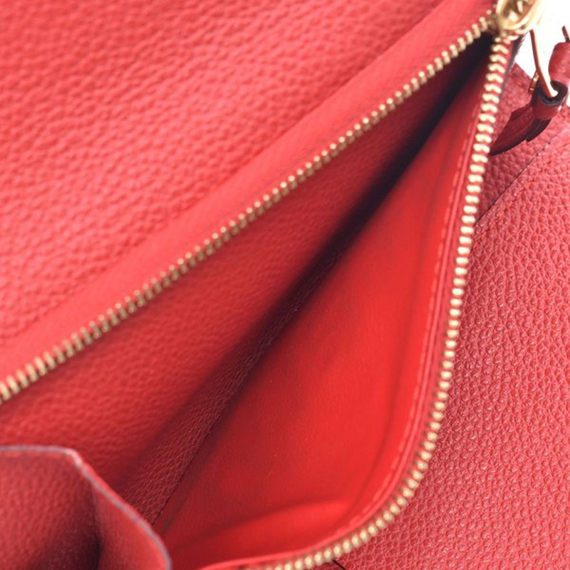 

Louis Vuitton Red Monogram Empreinte Leather Compact Curieuse Wallet