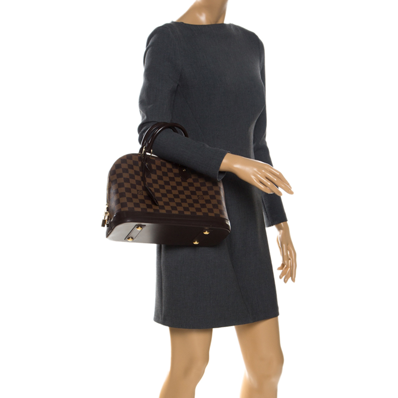 

Louis Vuitton Damier Ebene Canvas Alma PM Bag, Brown