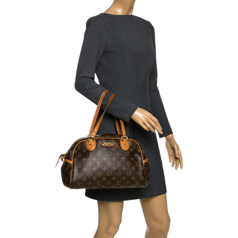 

Louis Vuitton Monogram Canvas and Leather Montorgueil PM Bag, Brown