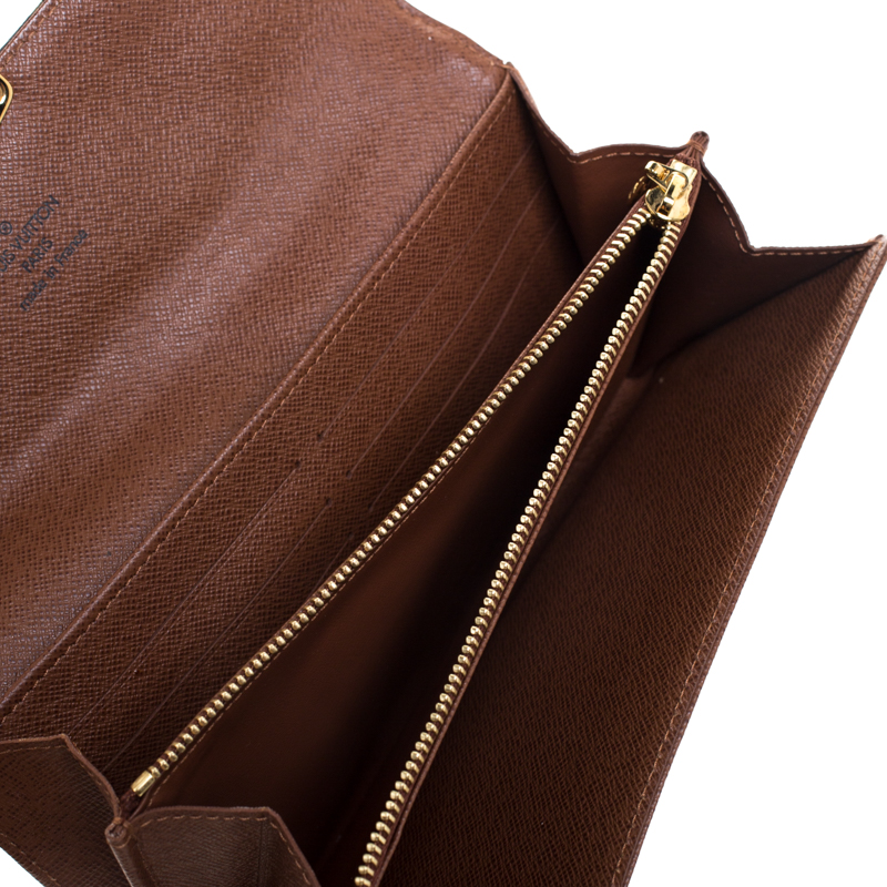 

Louis Vuitton Monogram Canvas Etoile Sarah Wallet, Brown