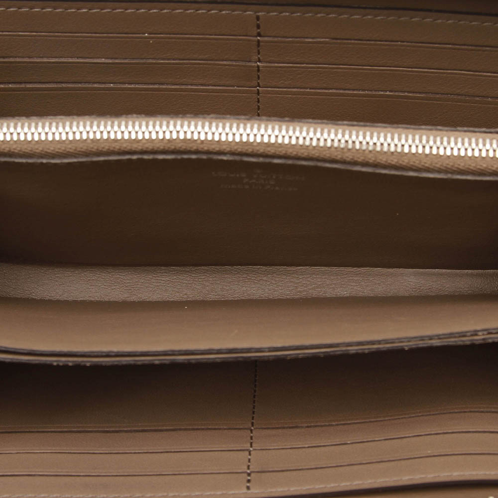 

Louis Vuitton Brown Leather Comete Wallet, Beige