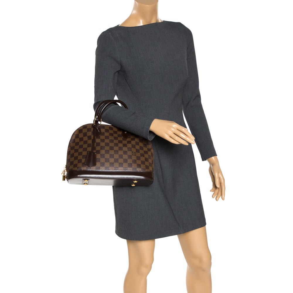 

Louis Vuitton Damier Ebene Canvas Alma PM Bag, Brown