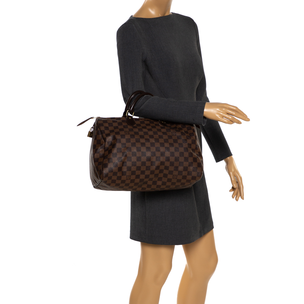 

Louis Vuitton Damier Ebene Canvas Speedy 35 Bag, Brown