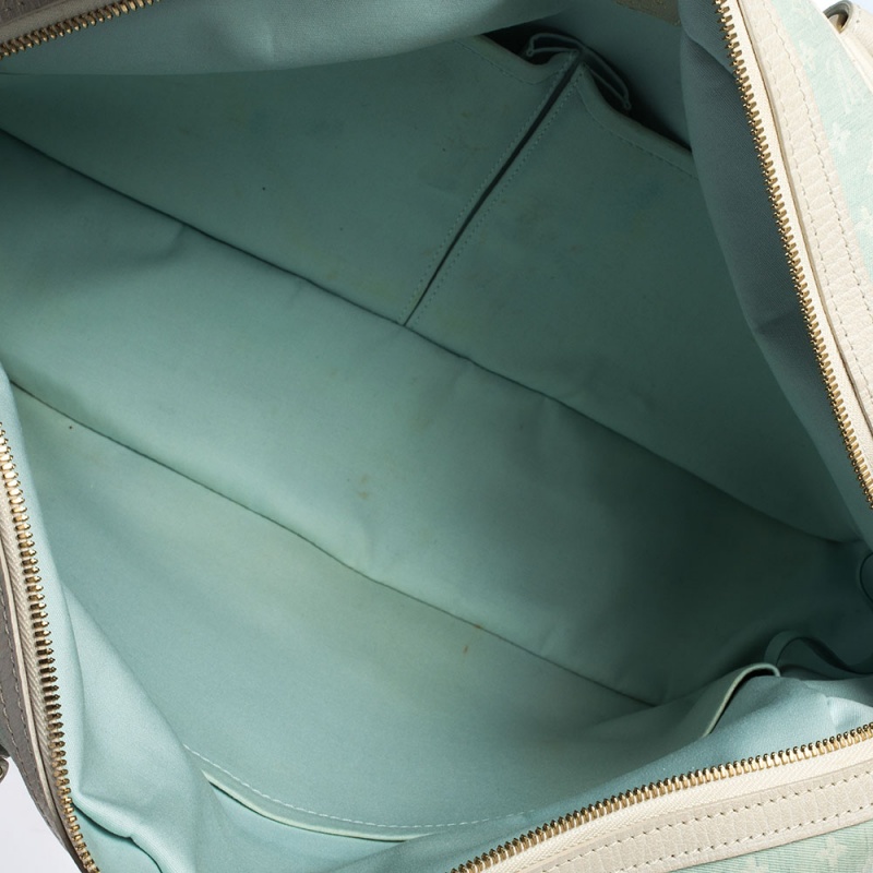 LOUIS VUITTON, a blue monogramed textile diaper bag, Mini Lin Sac a  Langer. - Bukowskis