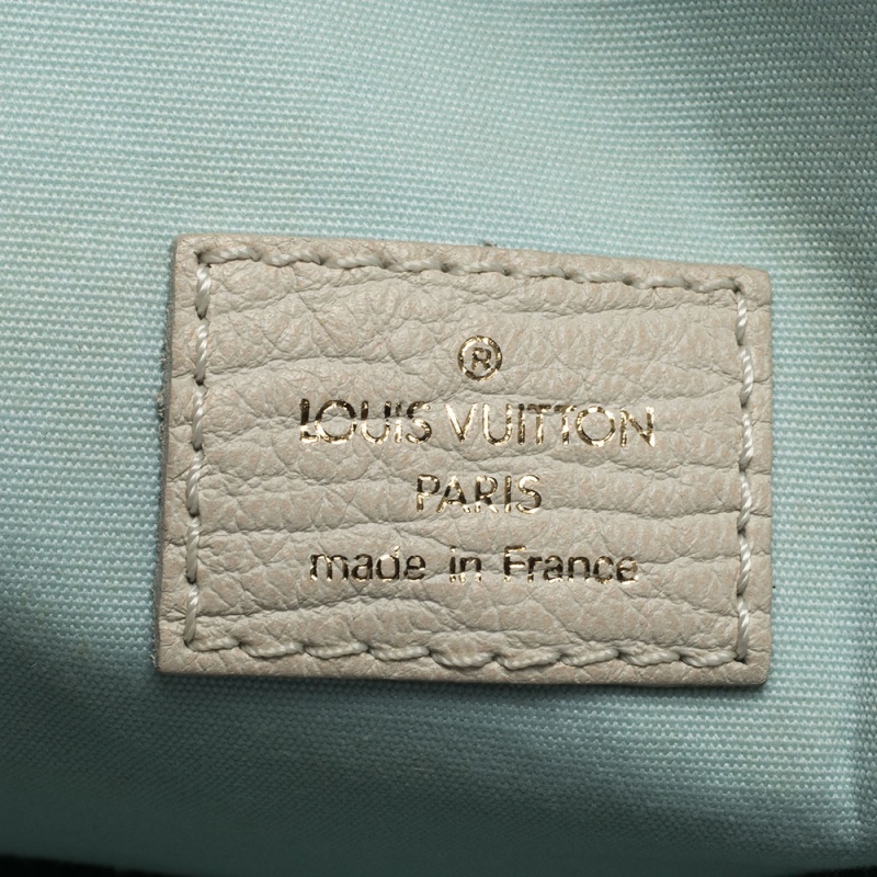 LOUIS VUITTON, a blue monogramed textile diaper bag, Mini Lin Sac a  Langer. - Bukowskis