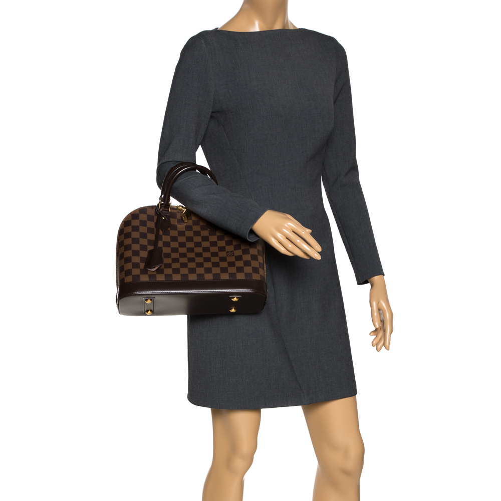 

Louis Vuitton Damier Ebene Canvas Alma PM Bag, Brown