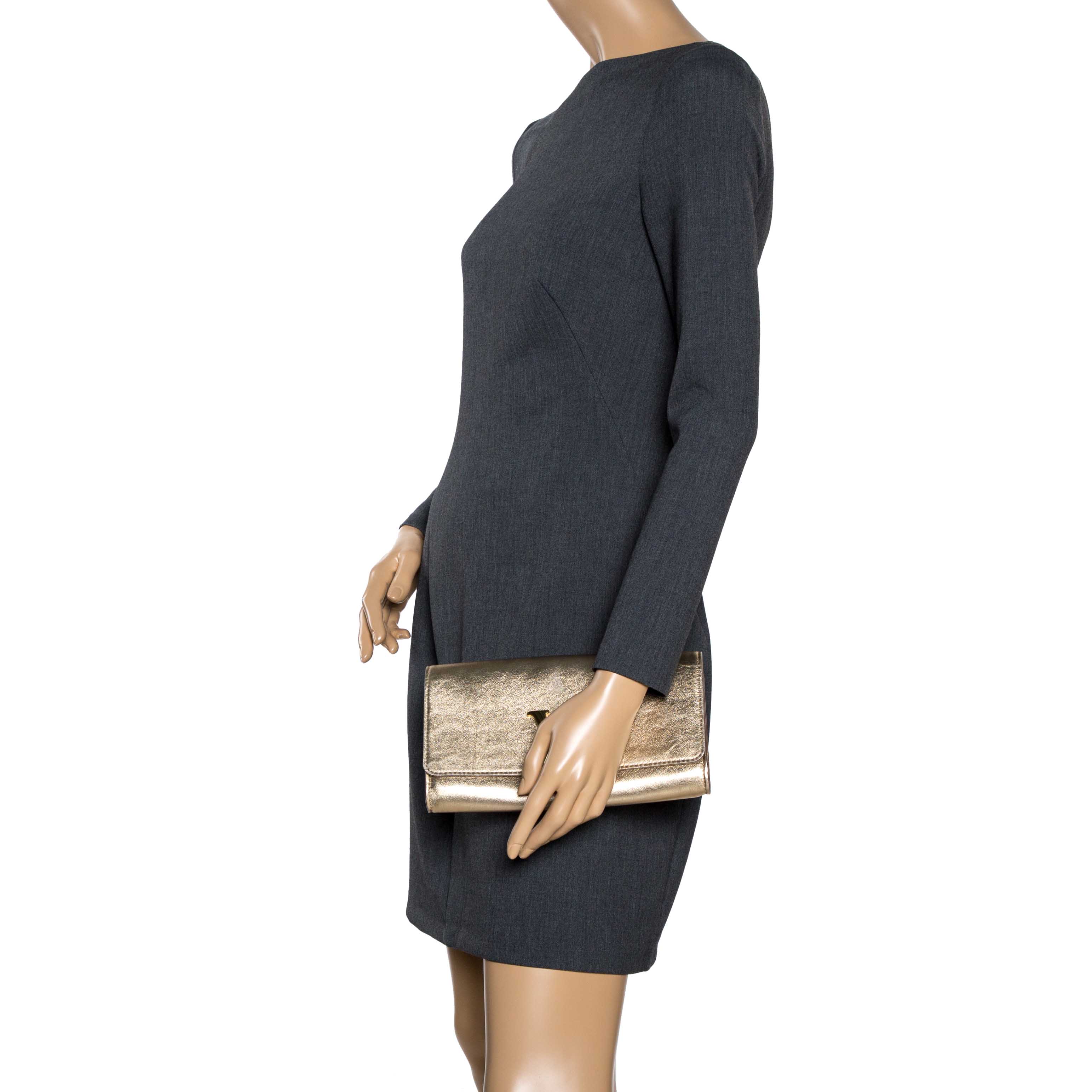 

Louis Vuitton Gold Leather Louise Clutch