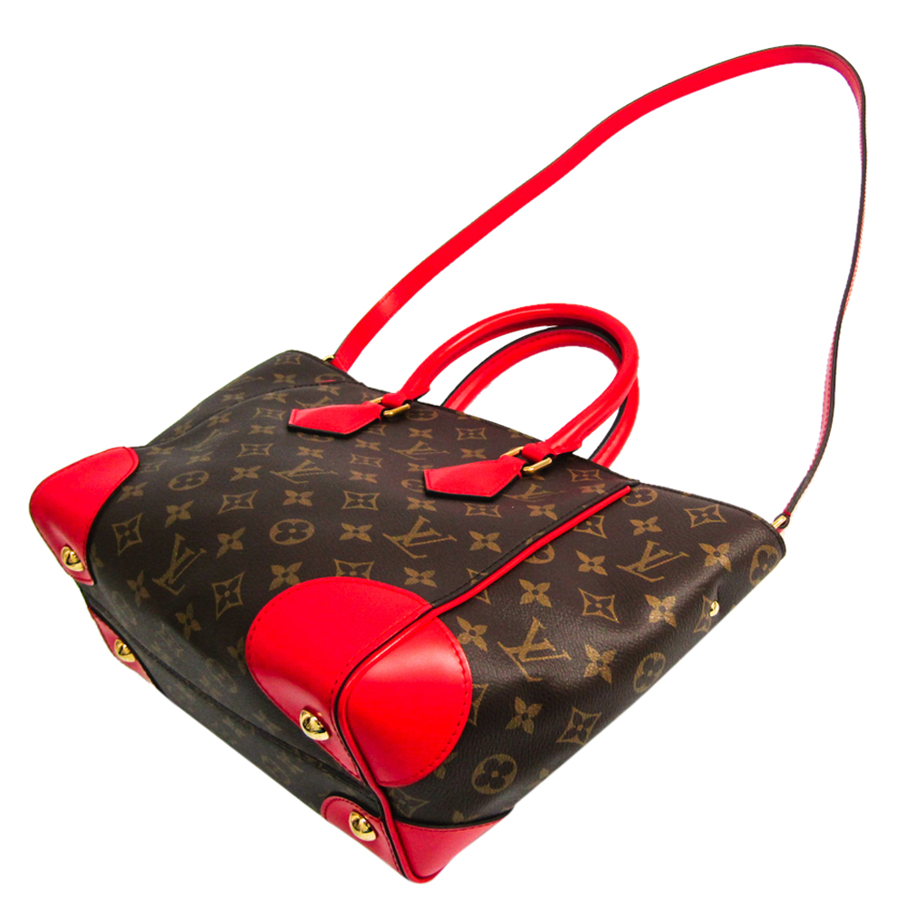 

Louis Vuitton Monogram Canvas Phoenix PM Bag, Brown