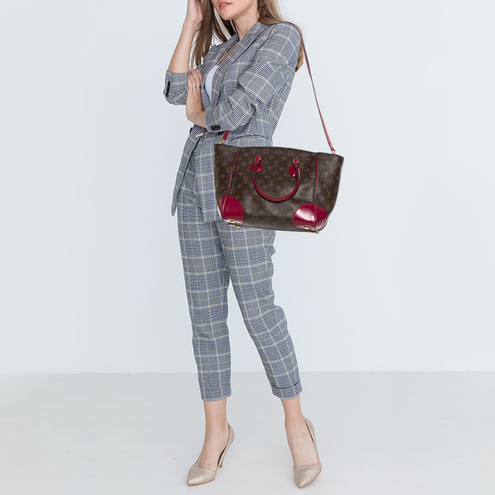 

Louis Vuitton Fuchsia Monogram Canvas Phenix MM Bag, Pink