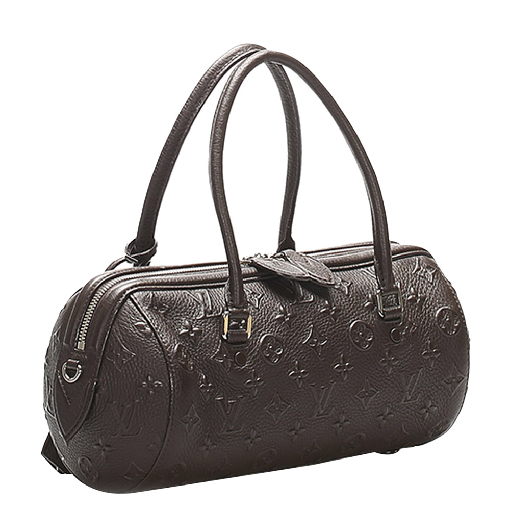 

Louis Vuitton Brown Monogram Leather Revelation Neo Papillon PM Bag