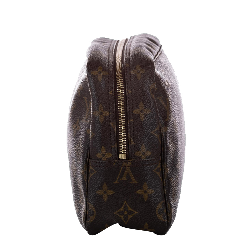 

Louis Vuitton Monogram Canvas Trousse Toilette 23 Clutch, Brown