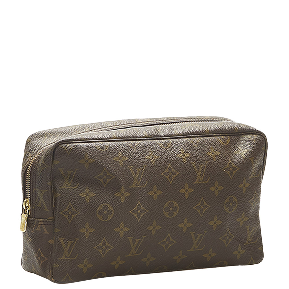 

Louis Vuitton Monogram Canvas Trousse Toilette 28 Clutch, Brown