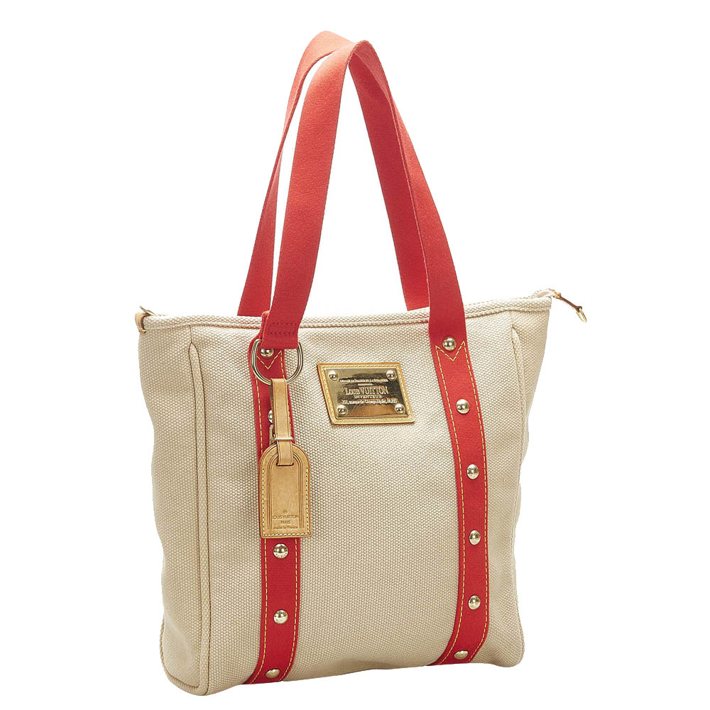 

Louis Vuitton Cream/Red Canvas Antigua Cabas MM Bag, Beige