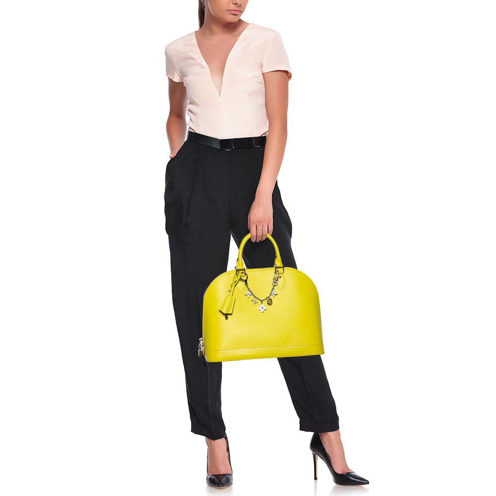 

Louis Vuitton Pistache Epi Leather Alma MM Bag, Yellow