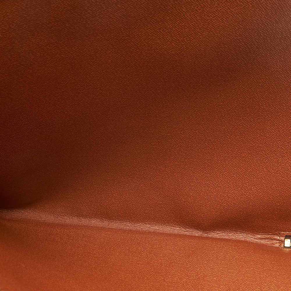 

Louis Vuitton Brown Canvas Clutch