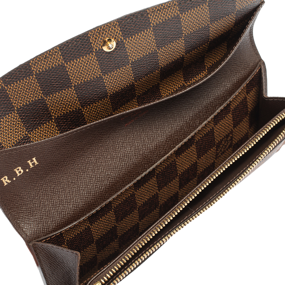 

Louis Vuitton Damier Ebene Canvas Emilie Wallet, Brown