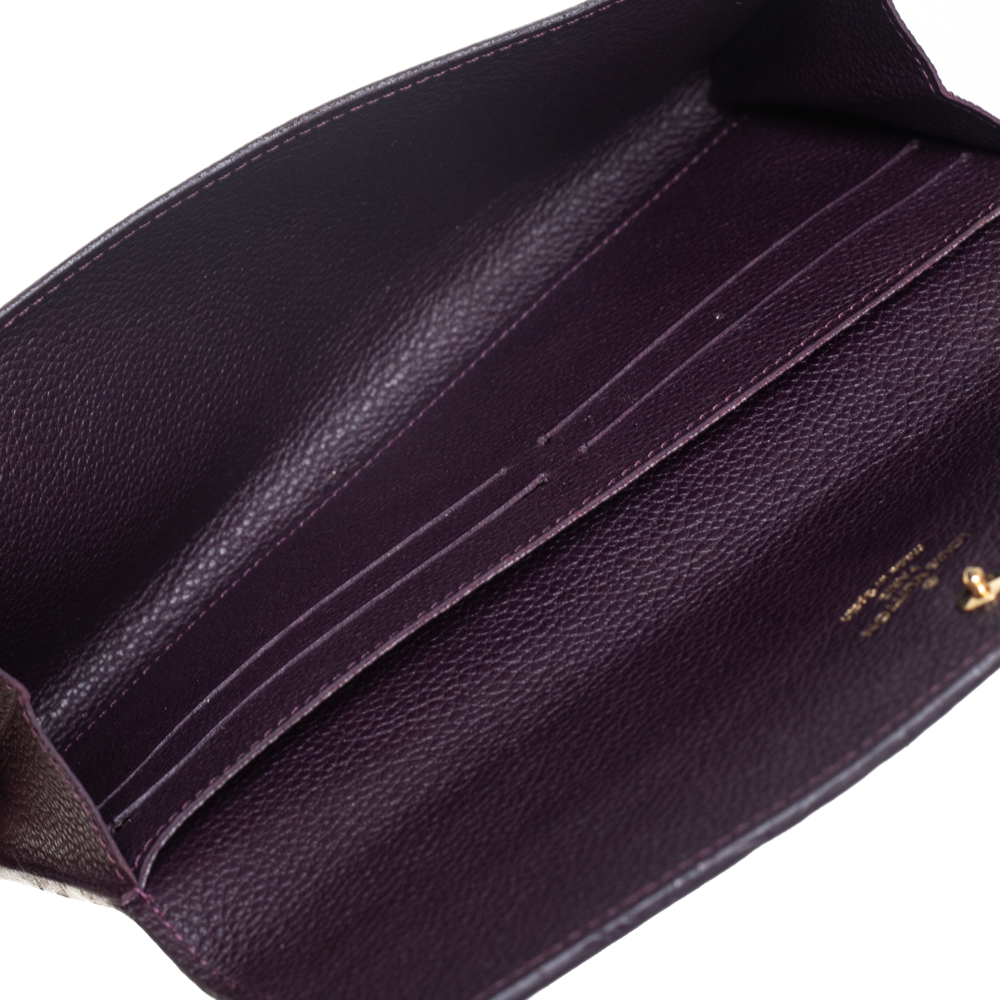 

Louis Vuitton Flamme Monogram Empreinte Leather Sarah Wallet, Purple