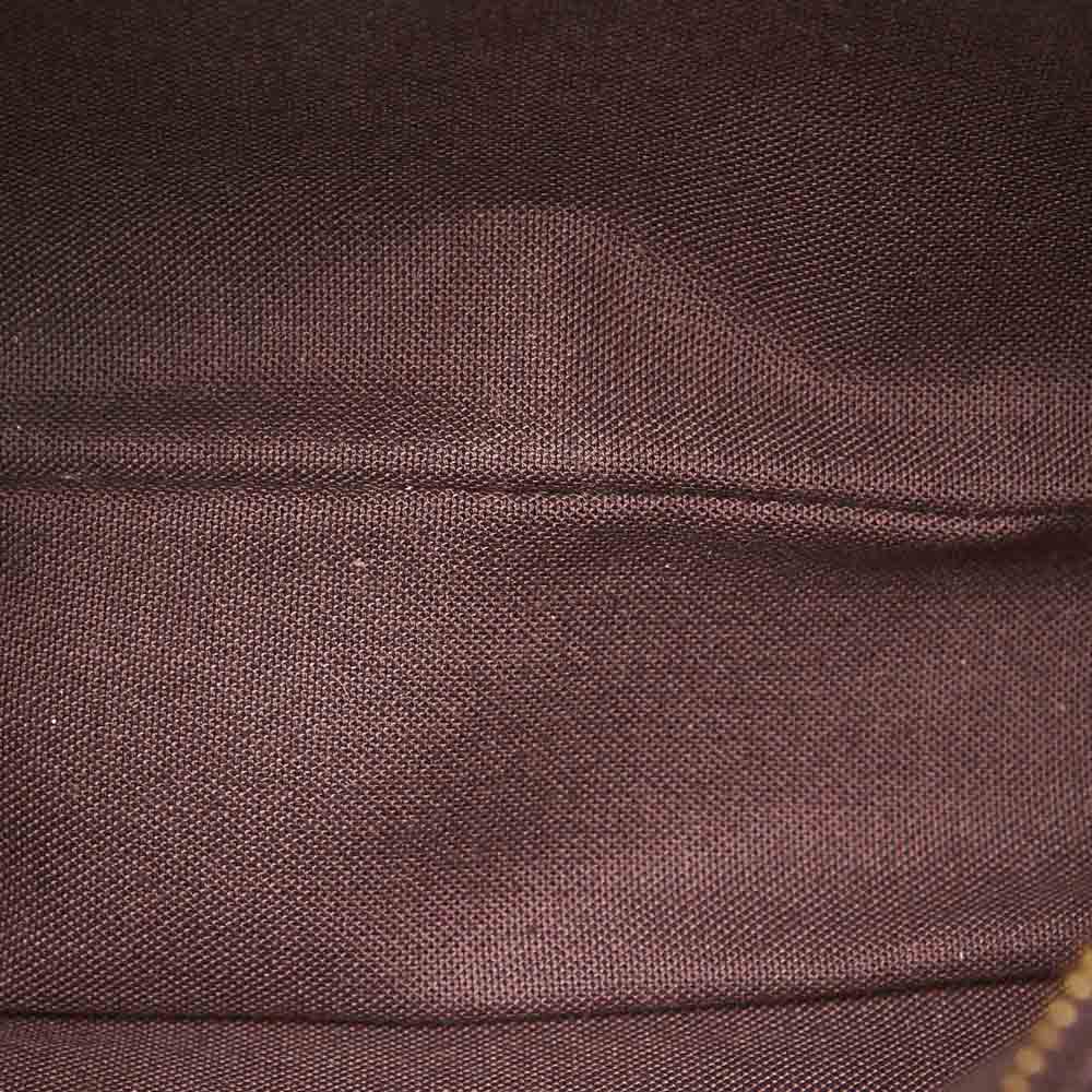 

Louis Vuitton Brown Leather Kaluga Clutch
