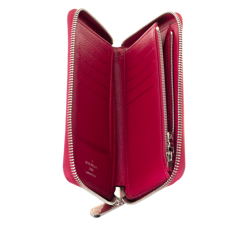 

Louis Vuitton Fuchsia Epi Leather Zippy Wallet, Pink