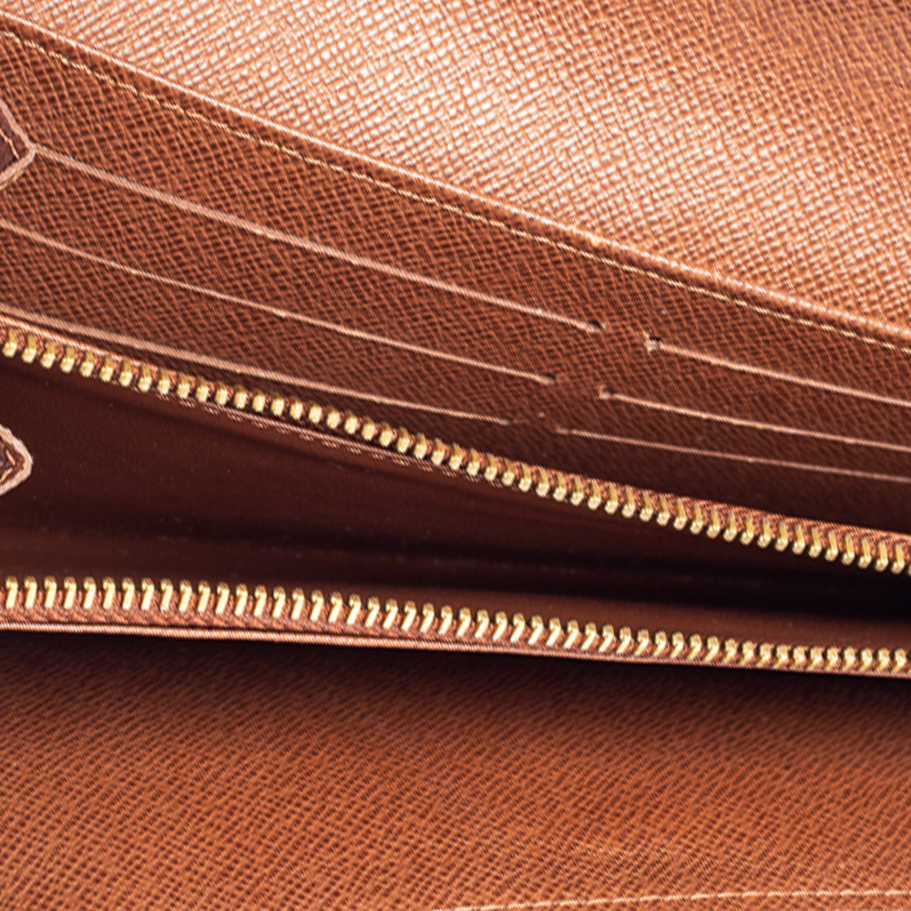

Louis Vuitton Monogram Coated Canvas Sarah Wallet, Brown