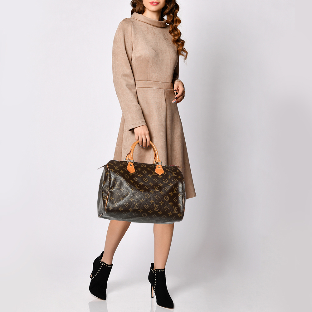 

Louis Vuitton Monogram Canvas Speedy 25 Bag, Brown