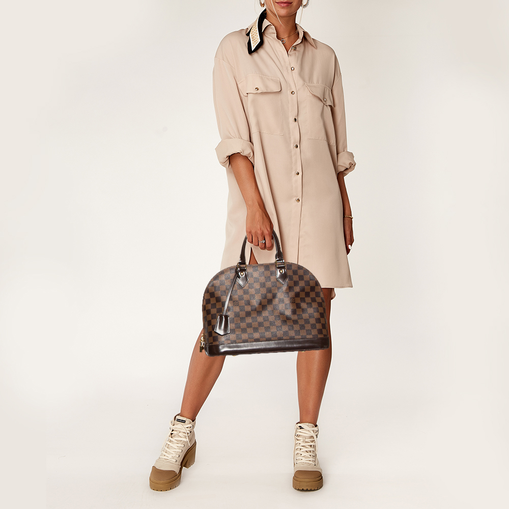 

Louis Vuitton Damier Ebene Canvas Alma MM Bag, Brown