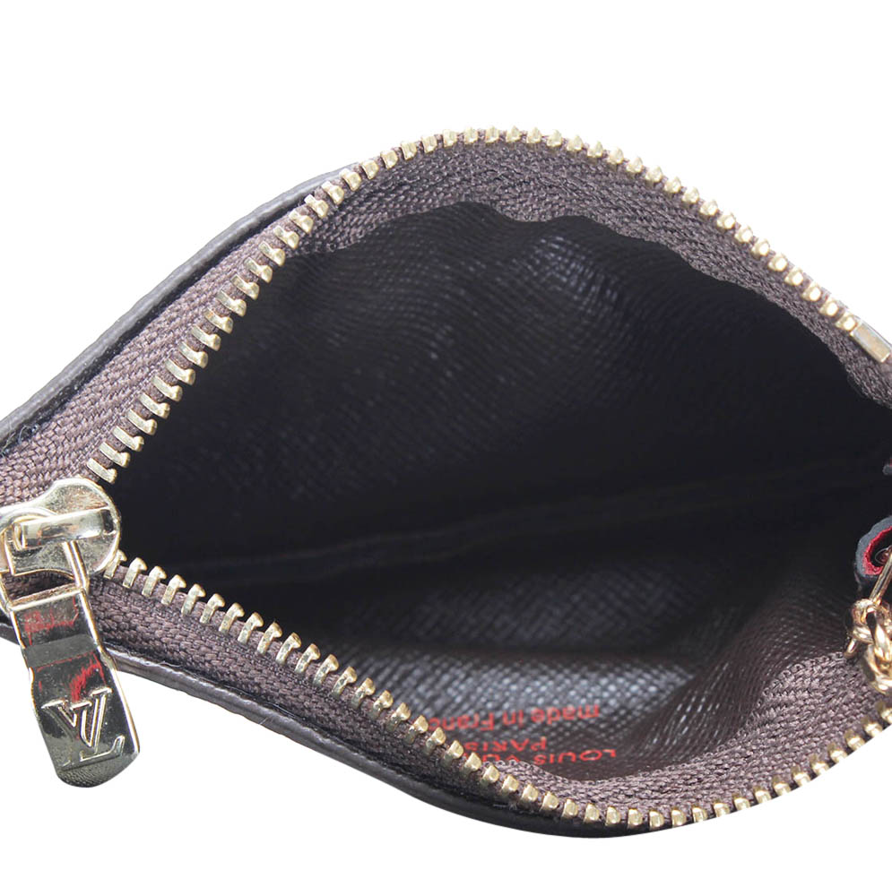 

Louis Vuitton Brown Monogram Canvas Coin Pouch
