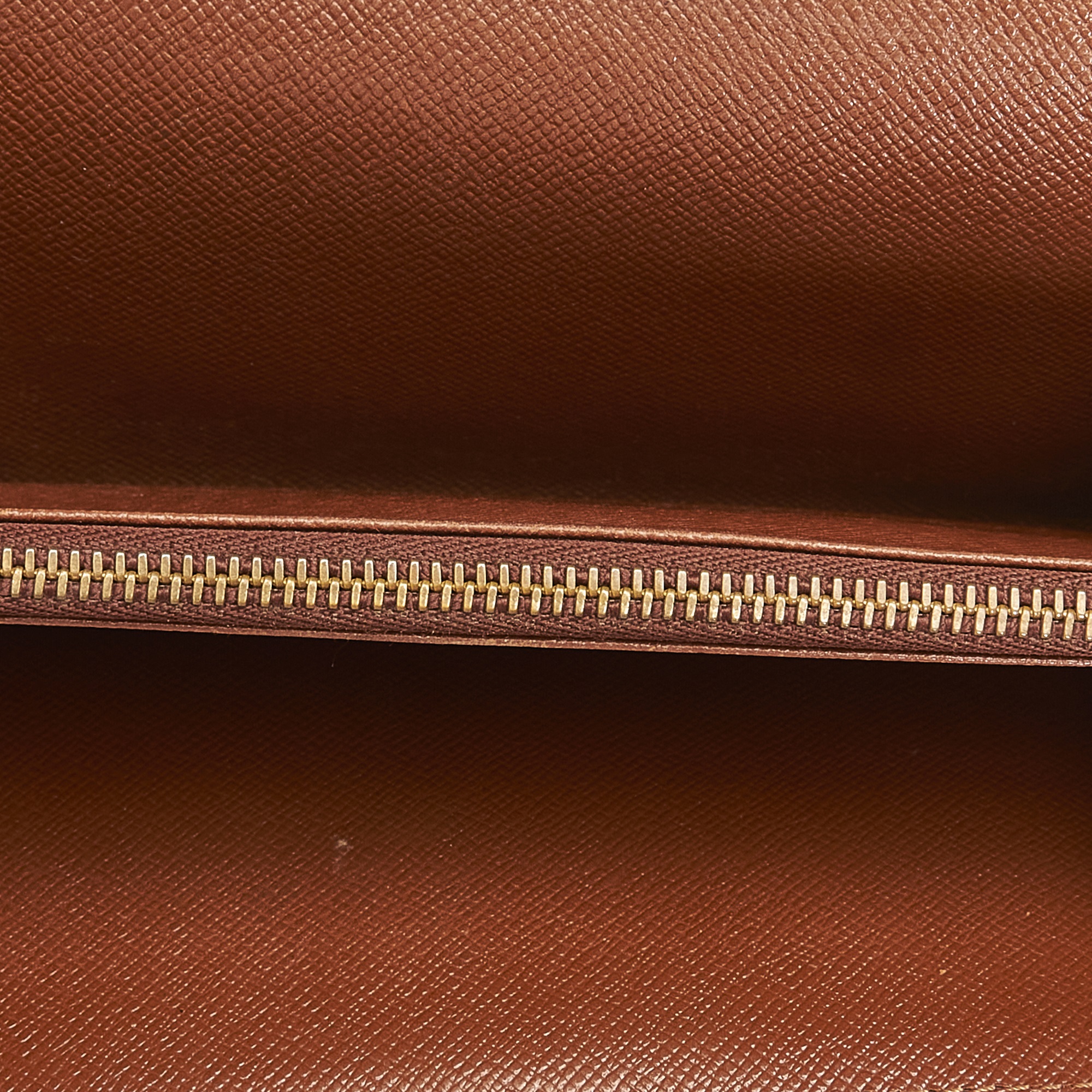 

Louis Vuitton Brown Monogram Canvas Sarah Long Wallet
