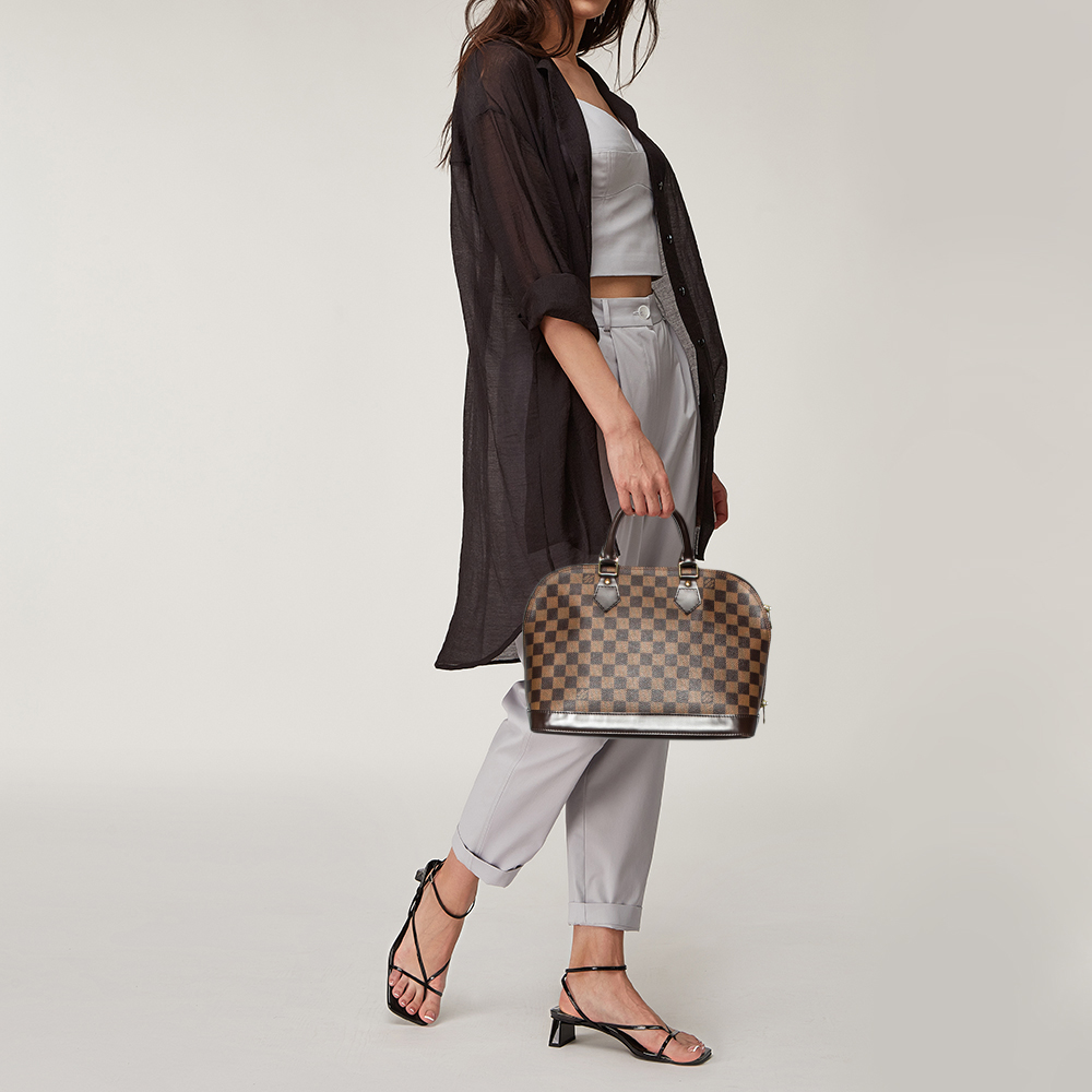 

Louis Vuitton Damier Ebene Canvas Alma PM Bag, Brown