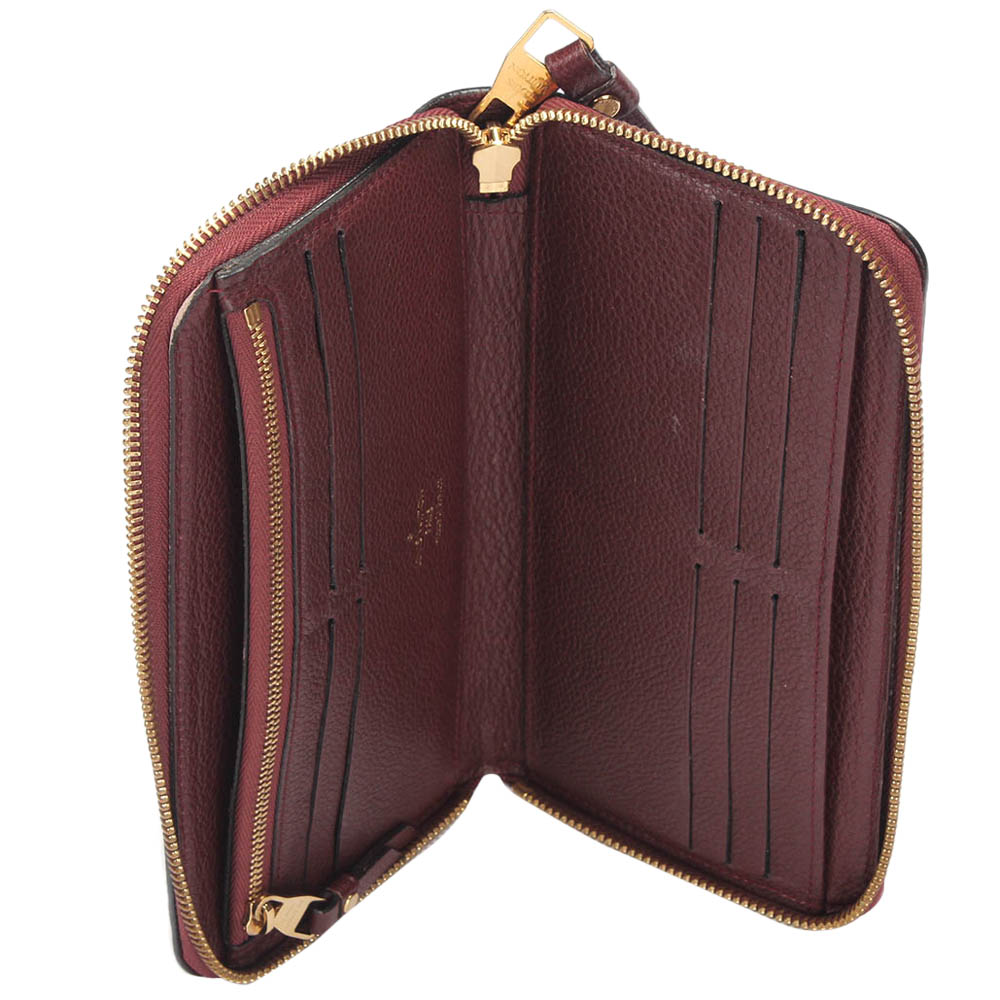 

Louis Vuitton Burgundy Monogram Empreinte Leather Zippy Wallet