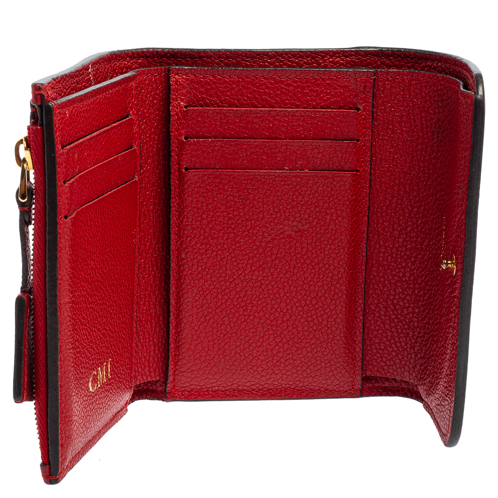

Louis Vuitton Cerise Monogram Leather Empreinte Pont Neuf Compact Wallet, Red