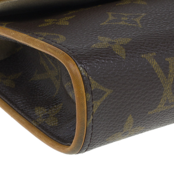 Louis Vuitton Florentine clutch bag in monogram canvas Brown Cloth  ref.1000755 - Joli Closet