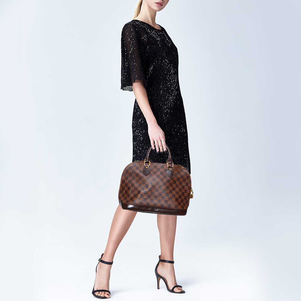 

Louis Vuitton Damier Ebene Canvas Alma PM Bag, Brown