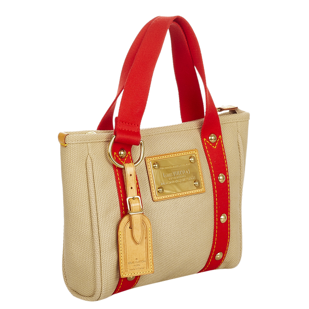 

Louis Vuitton Beige/Red Canvas Antigua Cabas PM Bag