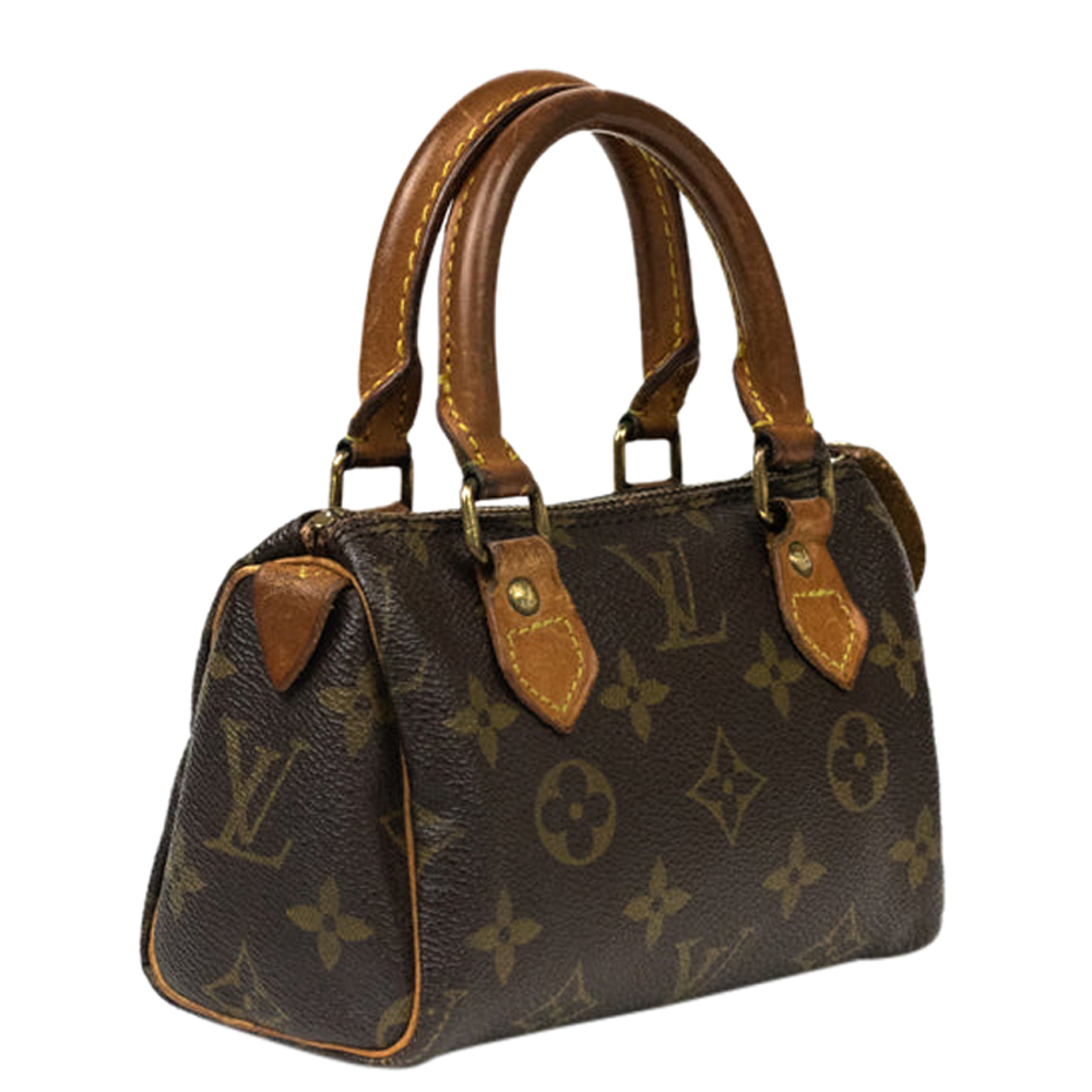 

Louis Vuitton Monogram Canvas Mini Speedy Bag, Brown