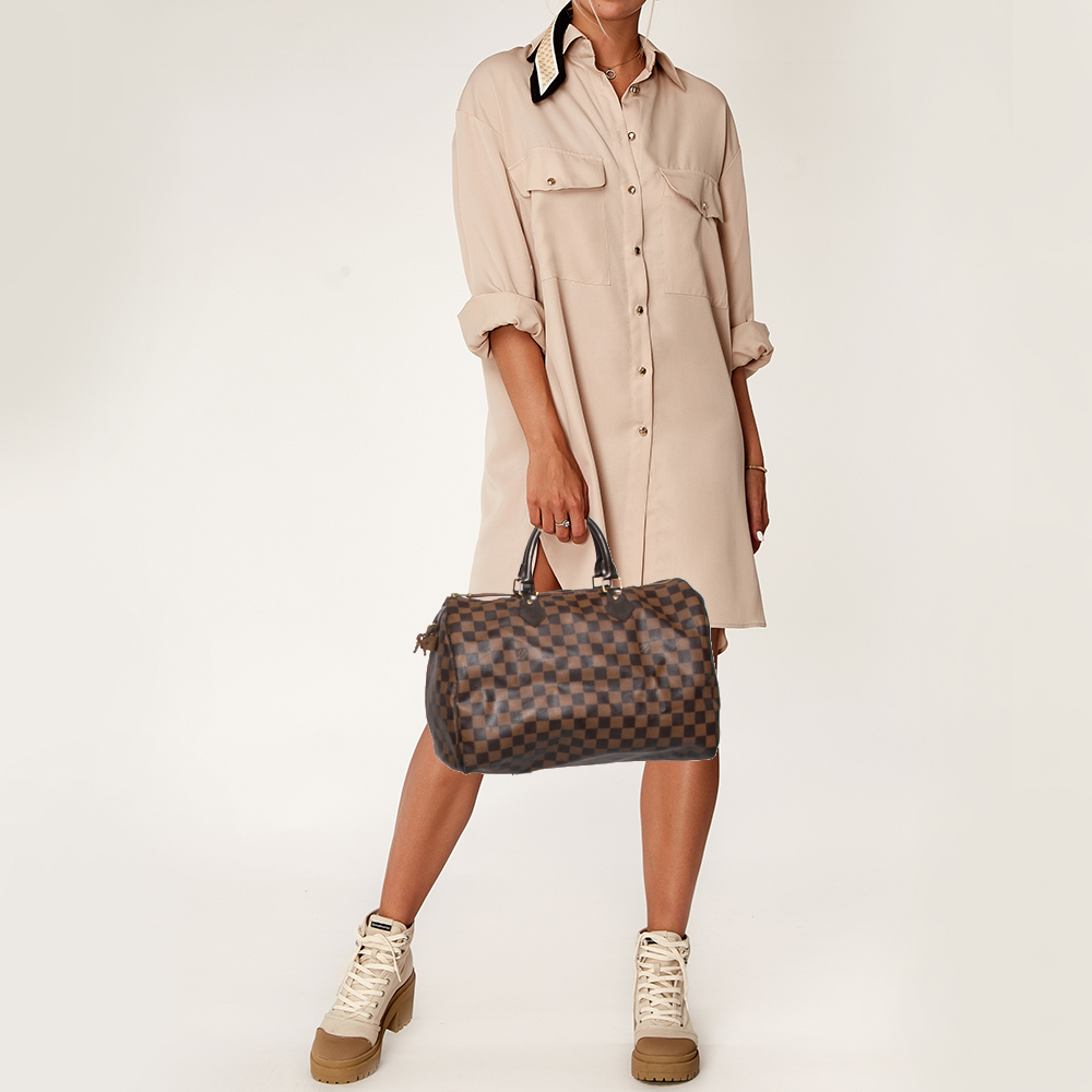 

Louis Vuitton Damier Ebene Canvas Speedy 35 Bag, Brown