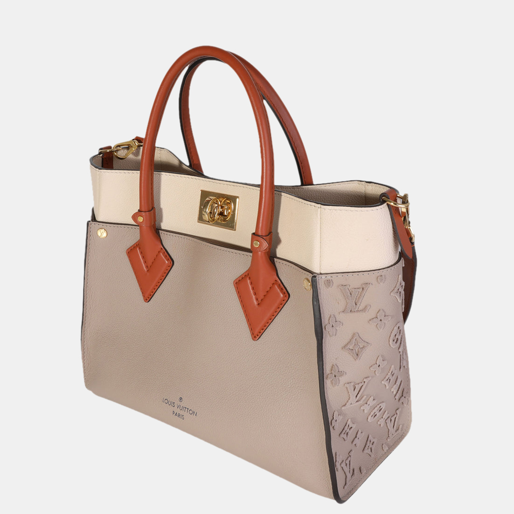 

Louis Vuitton Galet Calfskin Leather Tufted On My Side MM Tote Bag, Beige